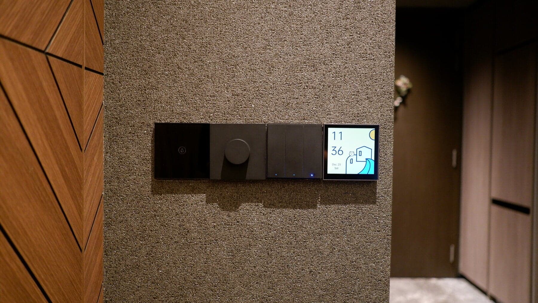 Smart switches and a touchscreen controller installed in a Singapore home