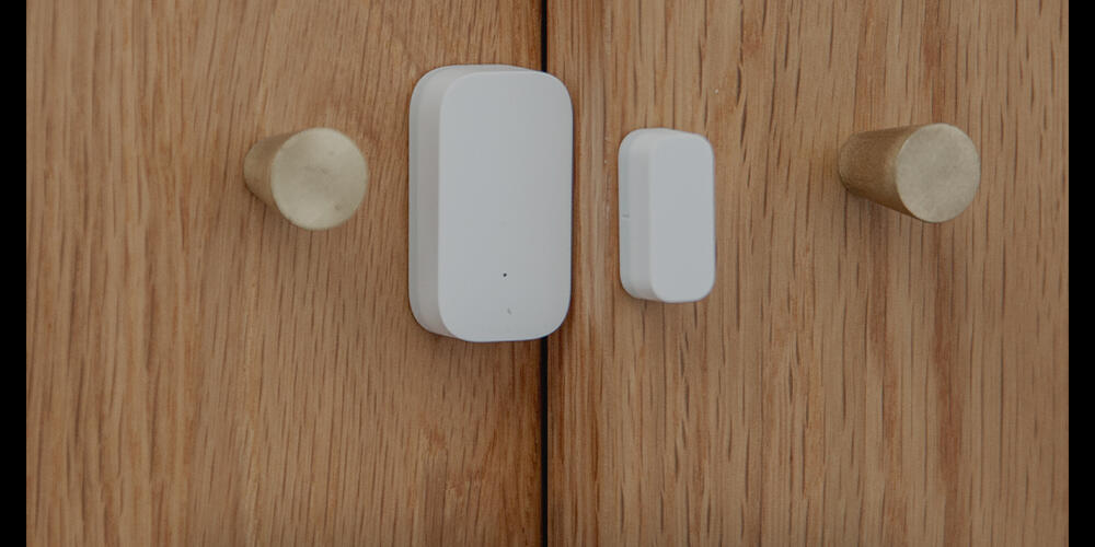 Door and Window Sensor T1 installed on an opening panel