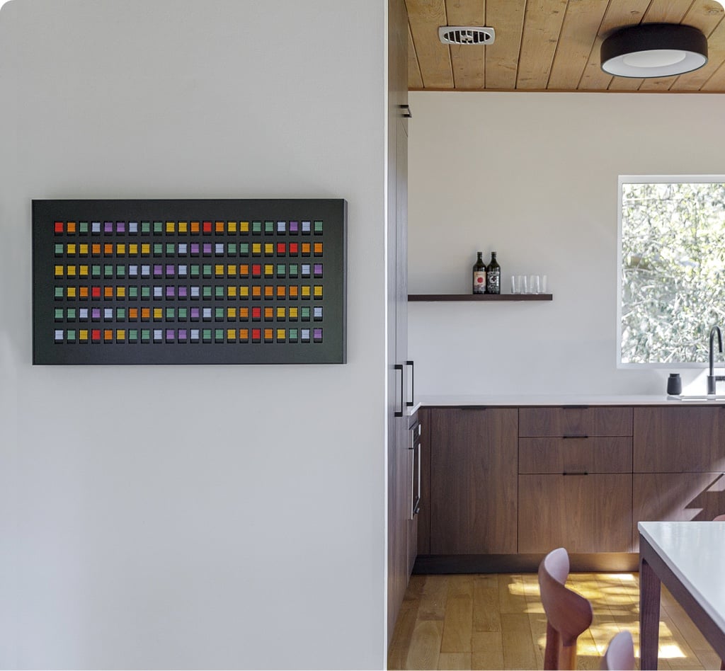 Vestaboard displayed in a home setting