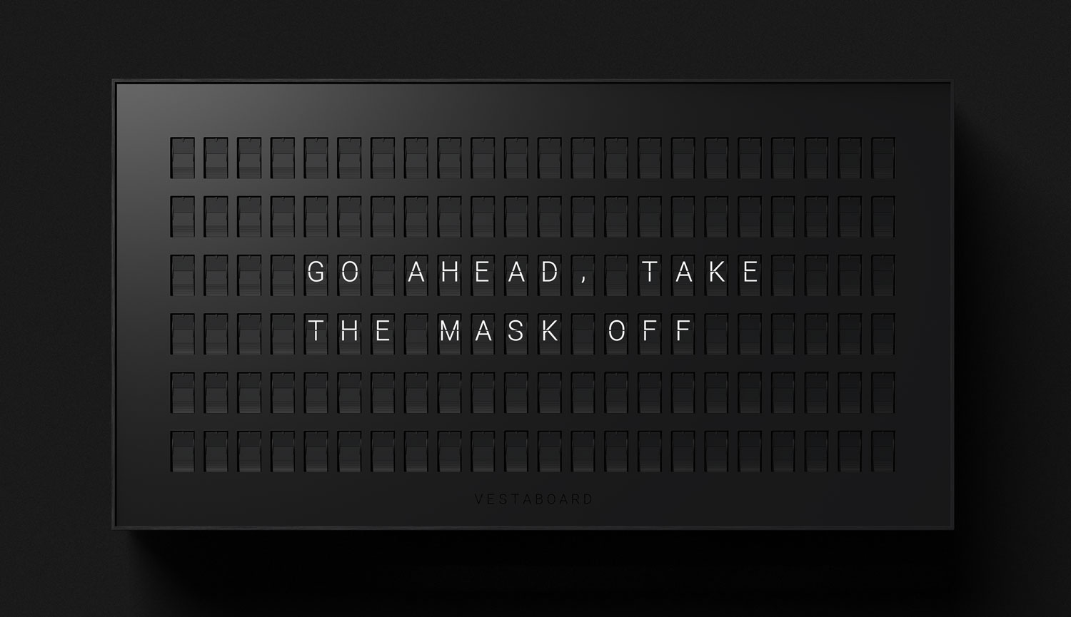 Vestaboard with frame and mask removed, showing 132 Bits