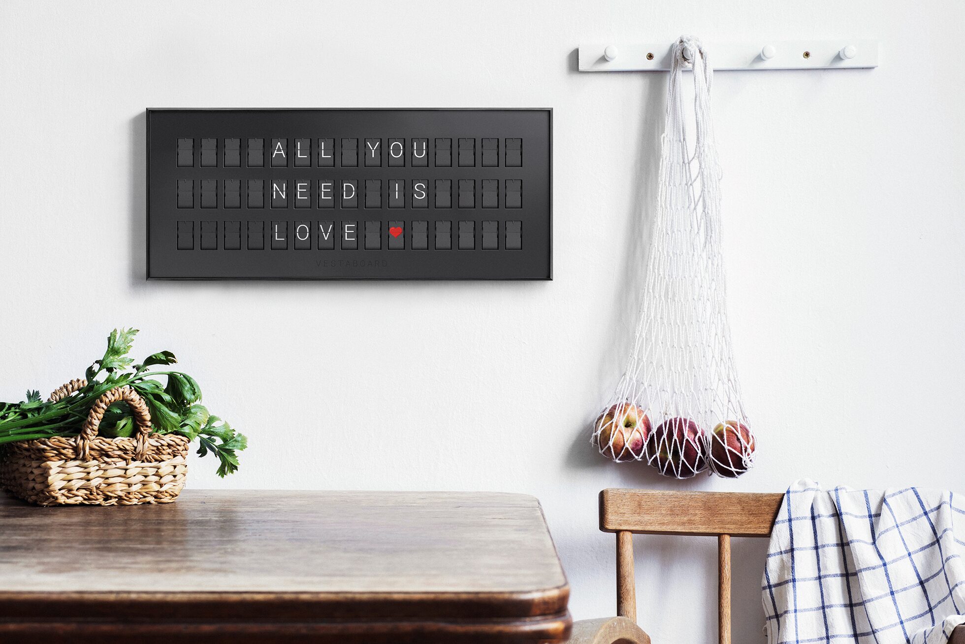 Vestaboard Note wall-mounted in a kitchen