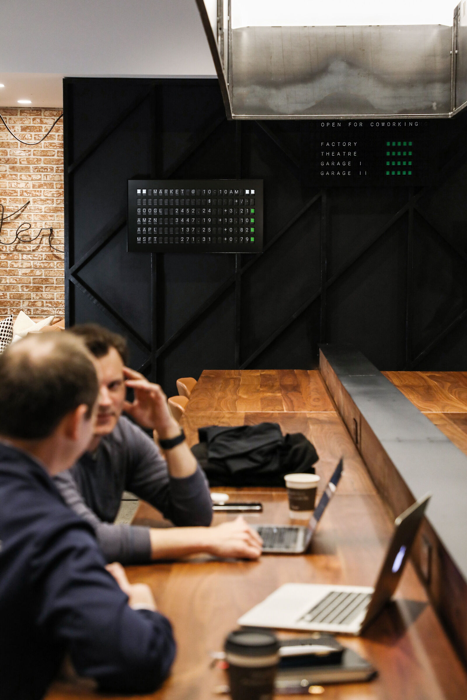 Vestaboard in a modern office environment