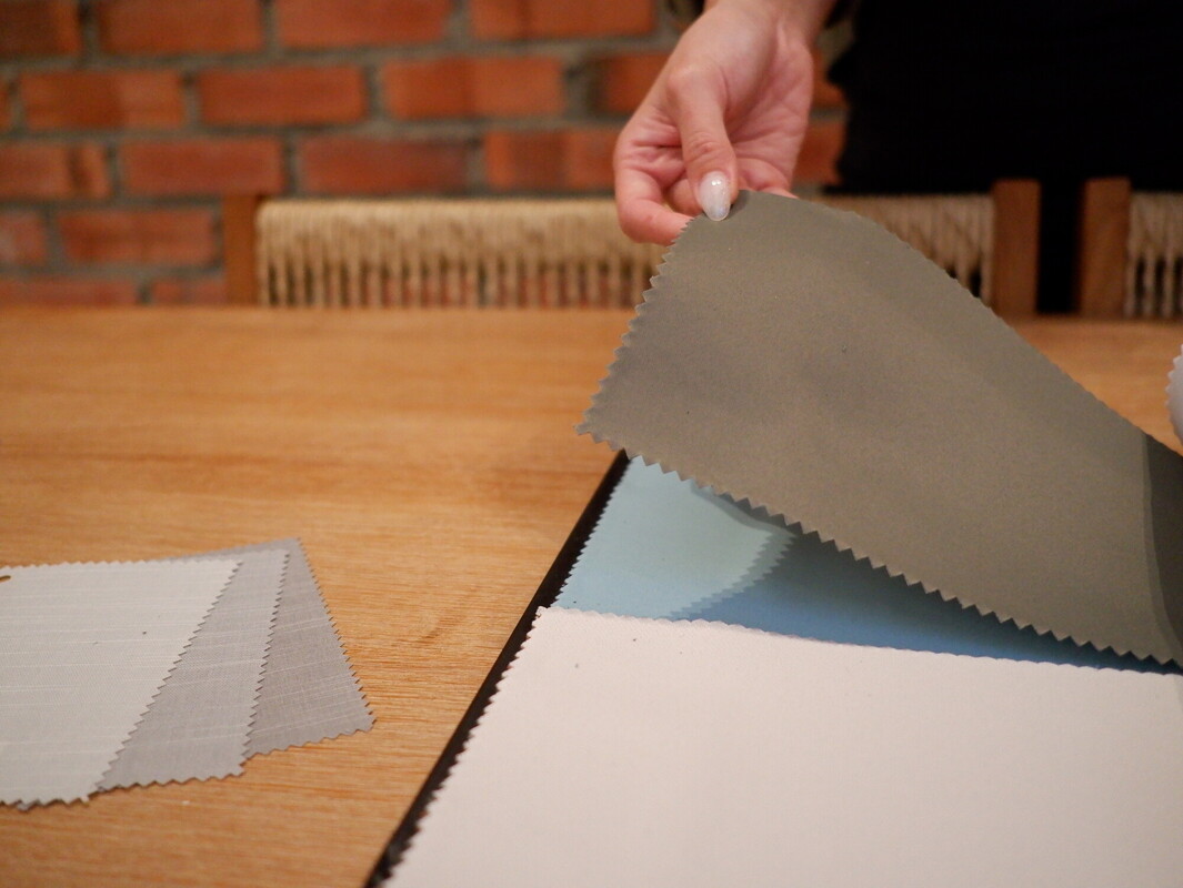 Curtain fabric samples being selected for a HomeSmart project