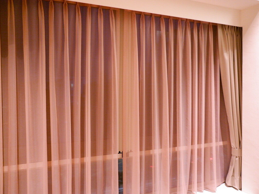 Day and night curtains installed in a Singapore home