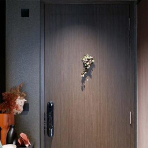 Finished main entrance with an installed smart door lock