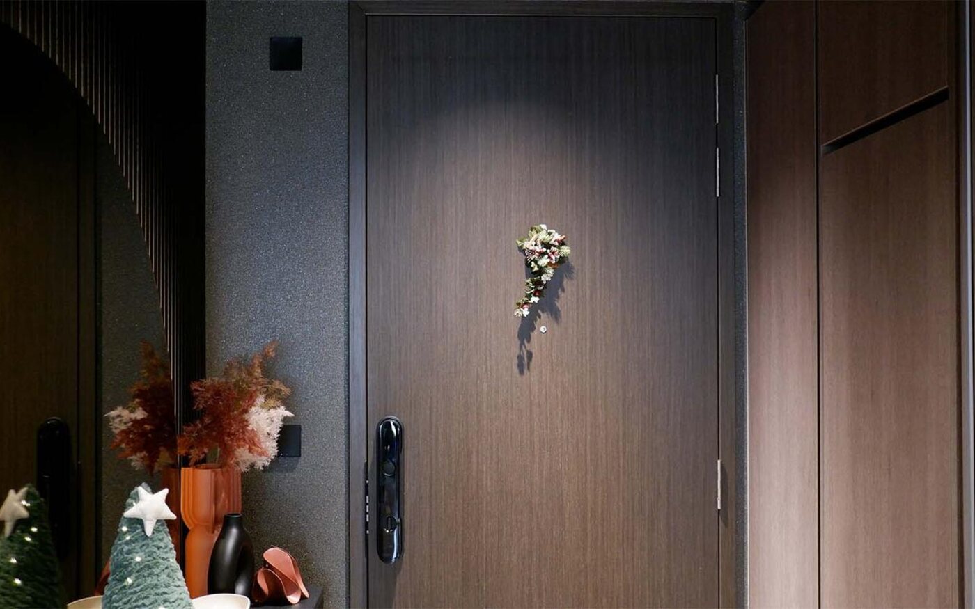 Finished main entrance with an installed smart door lock