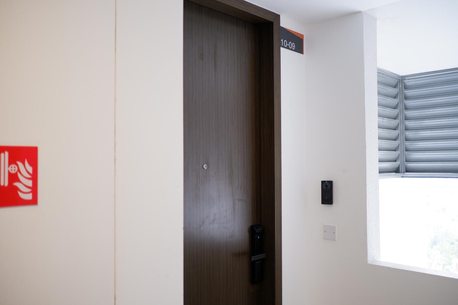 Completed smart lock installation on a Singapore apartment door