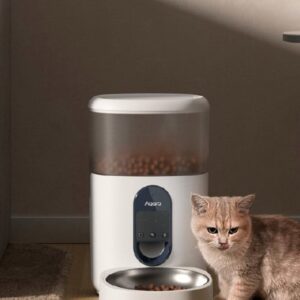 Cat beside an Aqara smart pet feeder