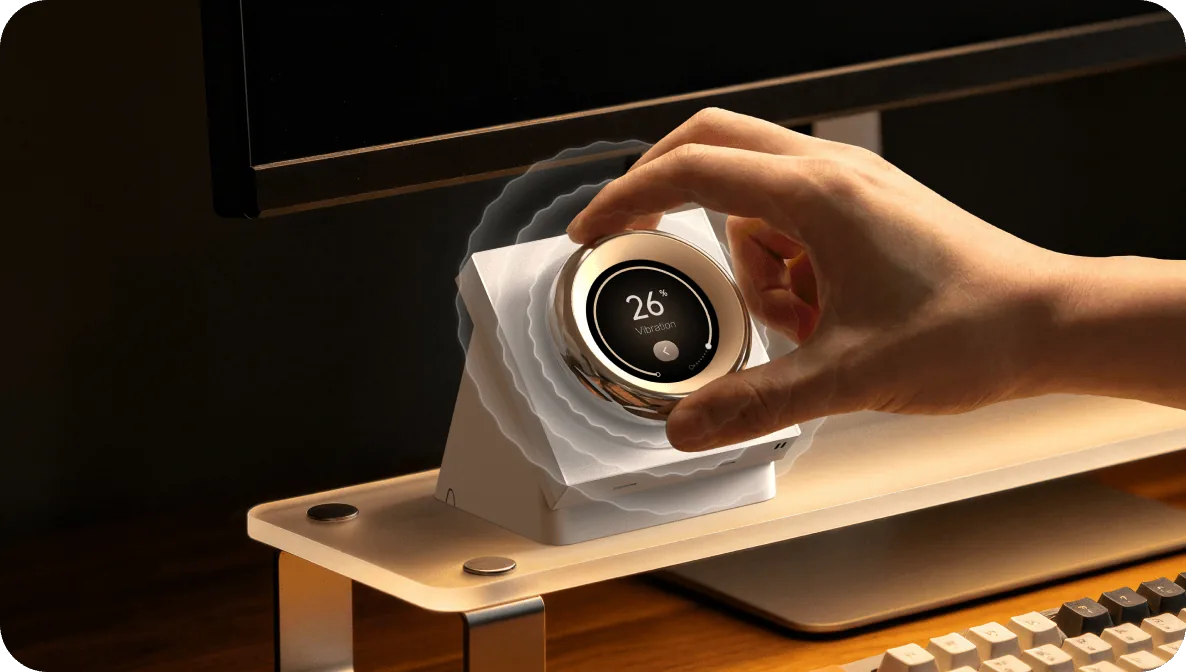 Hand turning the haptic dial of the Aqara Touchscreen Dial V1 Desktop Version