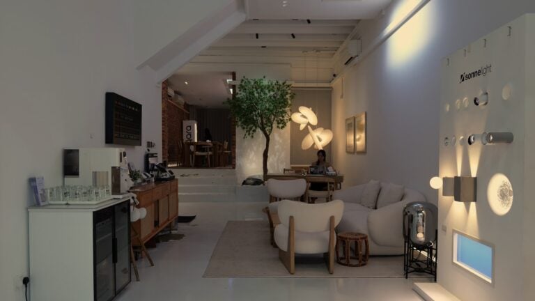 The HomeSmart showroom living room at Keong Saik Road under warm smart lighting