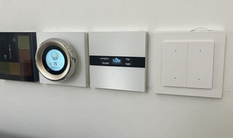 Aqara touchscreen, dial, scene panel and wall switch side by side on a wall